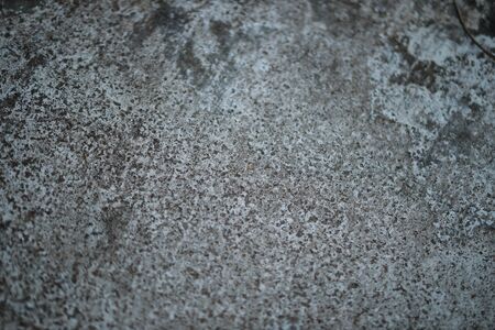 White old cement wall concrete backgrounds textured. Abstract vintage texture. Background from cracks, breaks, stains. Grunge cracks, damageの写真素材