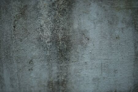 White old cement wall concrete backgrounds textured. Abstract vintage texture. Background from cracks, breaks, stains. Grunge cracks, damageの写真素材
