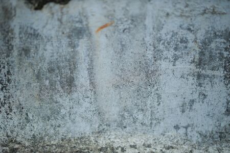 White old cement wall concrete backgrounds textured. Abstract vintage texture. Background from cracks, breaks, stains. Grunge cracks, damageの写真素材