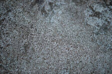 White old cement wall concrete backgrounds textured. Abstract vintage texture. Background from cracks, breaks, stains. Grunge cracks, damageの写真素材