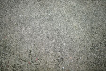 White old cement wall concrete backgrounds textured. Abstract vintage texture. Background from cracks, breaks, stains. Grunge cracks, damageの写真素材
