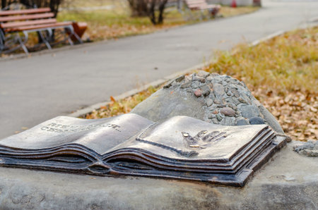 Metal sculpture in the form of an open book with the imprint of the palm. Grants wishes.の写真素材