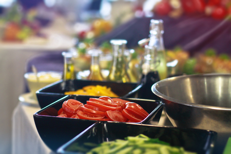 Fresh salad plates. The ingredients are fresh fruits and vegetables. Background bokeh for designの写真素材