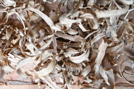 Beautiful carpentry background. Sawdust in focus and with a blurry image. Abstract composition for design. Stock photo.の写真素材