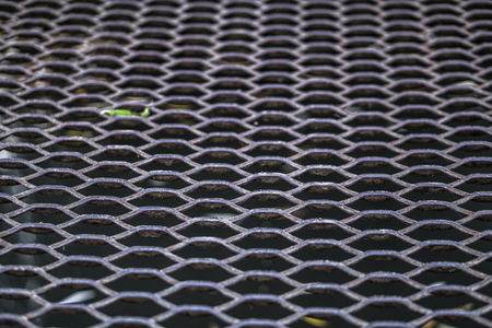 Old lattice, mesh. Decorative mesh, grunge texture.の写真素材