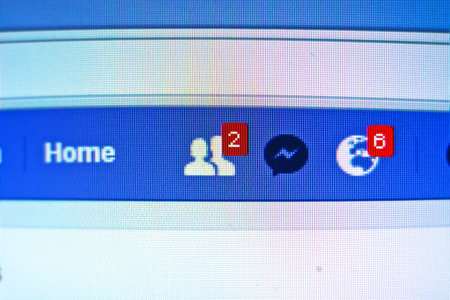 Ukraine - summer 2018. The facebook website photographed through the macro-ring. Social network on...
