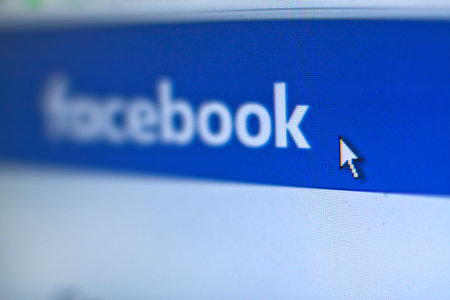 Ukraine - summer 2018. The facebook website photographed through the macro-ring. Social network on...