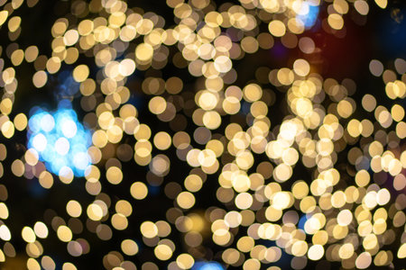 Beautiful Christmas background with garlands and bokeh. New year  multi-colored picture. Abstract...