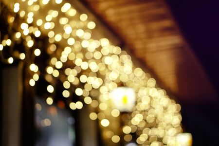 Beautiful Christmas background with garlands and bokeh. New year  multi-colored picture. Abstract photo image for designの写真素材