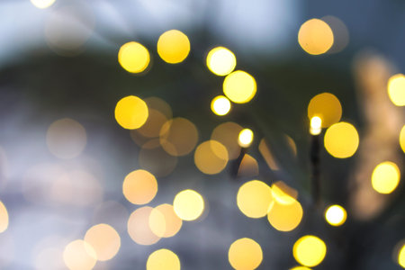 Beautiful Christmas background with garlands and bokeh. New year  multi-colored picture. Abstract...