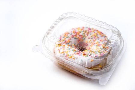 Beautiful juicy donut with a sweet cream.
Cupcake on white Background for kitchen design.の写真素材