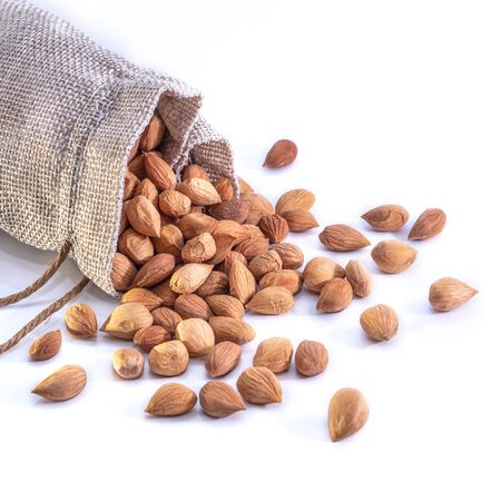 Migdal on a white isolated background. Food nuts for your website design. Theme of cooking and cookingの写真素材