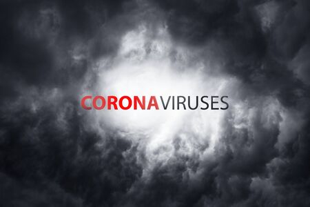 Warning about the scary coronavirus virus. World pandemic with the bacterium COVID-19. Wuhan city a threat to humanity against the backdrop of thundercloudsの写真素材