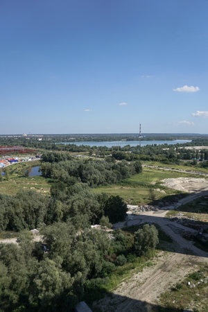 Outskirts of the city industrial zone on the background of a river or lake. Stock photo for designの写真素材