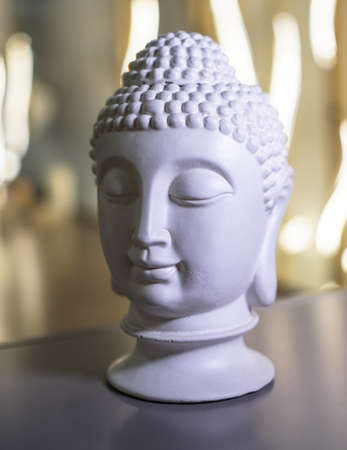 Sculpture of a bust of a Buddha. Eastern god in Buddhism. India and Sri Lanka beliefsの写真素材