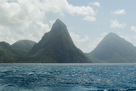 View across the bay at Soufriere to the sea and Piton mountain.の写真素材