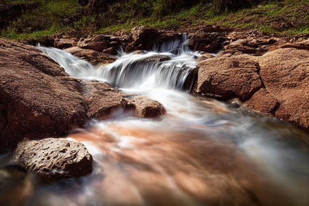 Beautiful waterfall in the forest with long exposure. Natural background.の素材