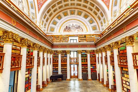 Helsinki Finland - September 19th 2019: National Library of Finland. Inside the building with book shelves and study tables. Photo from height.のeditorial素材