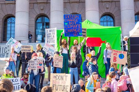 Helsinki, Finland - September 27 2019: Young students gather in climate change protest rally, School Strike 4 Climate, and demand urgent action on climate change.のeditorial素材