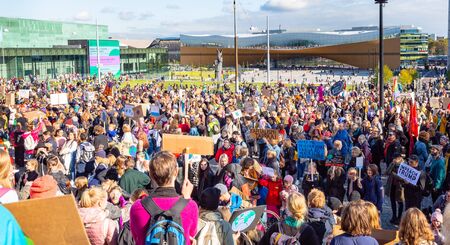 Helsinki, Finland - September 27 2019: Young students gather in climate change protest rally, School Strike 4 Climate, and demand urgent action on climate change.のeditorial素材