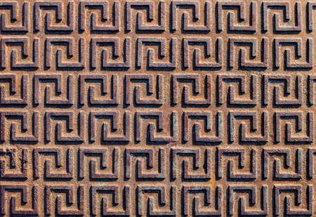 A uniform pattern on an old rusty iron surface. View from above.の写真素材