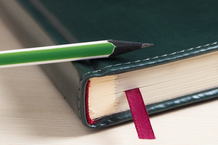Notebook with pencil.の写真素材
