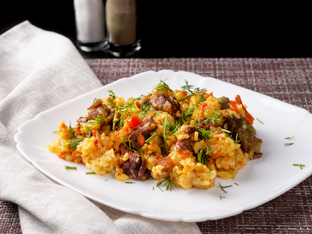 traditional pilaf on a white plateの写真素材