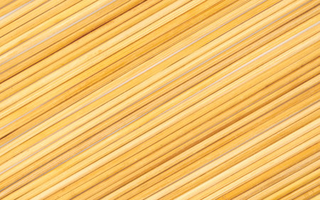 Long thin wooden sticks as a natural background