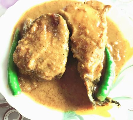 Two pieces of fish in a plateの素材