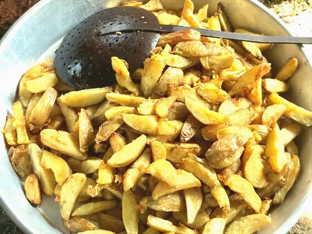 A large basin of French fryの素材