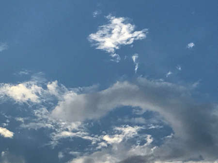 An exotic cloudscape in the blue skyの素材