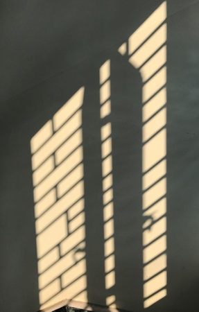 A beautiful designed reflection in a wallの素材