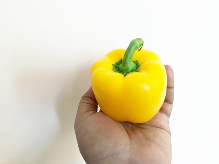 An yellow coloured bell pepper or capsicumの素材