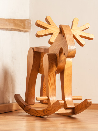 Wooden deer a rocking chair toy high qualityの写真素材