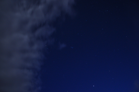 night sky with stars and clouds in high qualityの写真素材