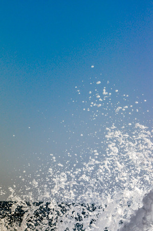 colorful splash of waves close-up in high qualityの写真素材