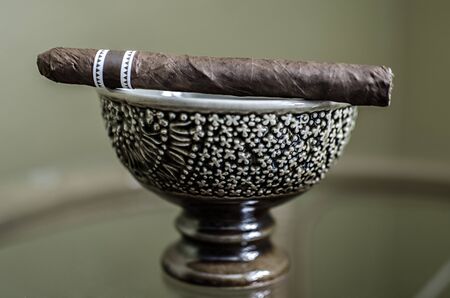 cigar on bowlの写真素材