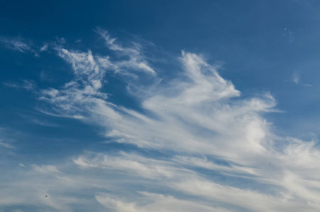 Clouds in the sky drifting away