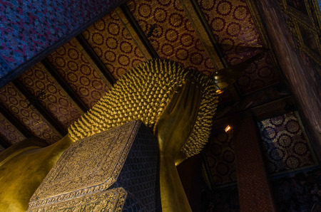 The reclining Buddha at Wat Pho in Bangkok, Thailand. Largest reclining Buddha in the world.のeditorial素材