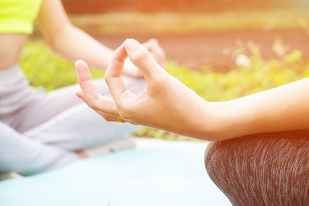 Asian Woman Yoga relax in natureの写真素材