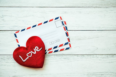 Red heart on the letter blank.