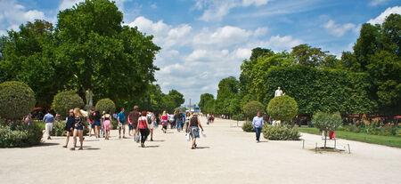 Paris, France - July 7, 2011 - Both Parisians and tourists enjoy a sunny afternoon at the Tuileries Garden (Jardin des Tuileries) in Paris. Recently, France unveiled measures to boost tourism even more in the world's most visited city.のeditorial素材