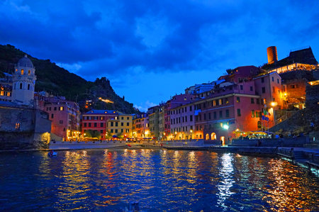 Dusk at the harbor in Vernazza in the Cinque Terre, Italyの写真素材
