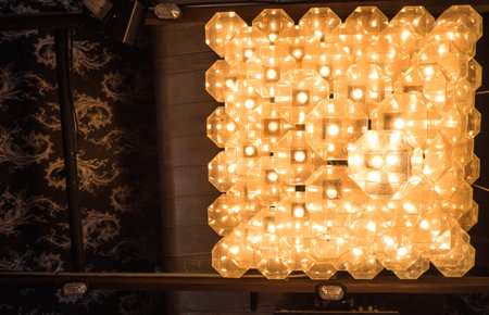Square lamp hanging on ceiling.