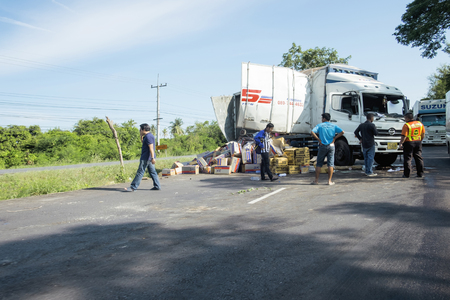 Southern Highway Thailand-Sep 14, 2017 : The truck is overturned on the road. Truck accident on southern highway.のeditorial素材