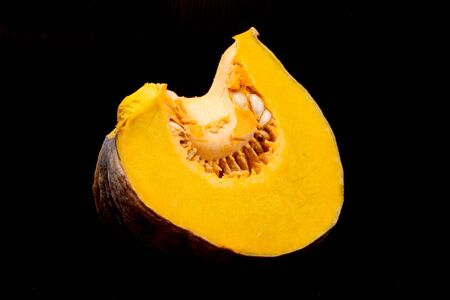 pumkpin in isolated on blackの写真素材