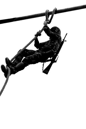 soldier climbing ropeの写真素材