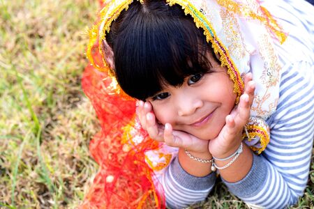 Thai beauty small girl on playgroundの写真素材