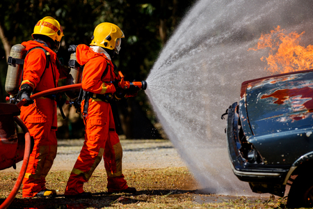 Firefighters are fighting fire with a  fire brigadeのeditorial素材