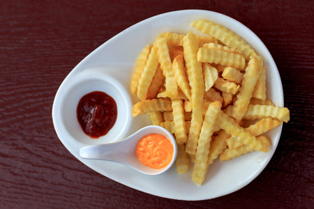 French fries with delicious sauces And delicious, taken at the top view.